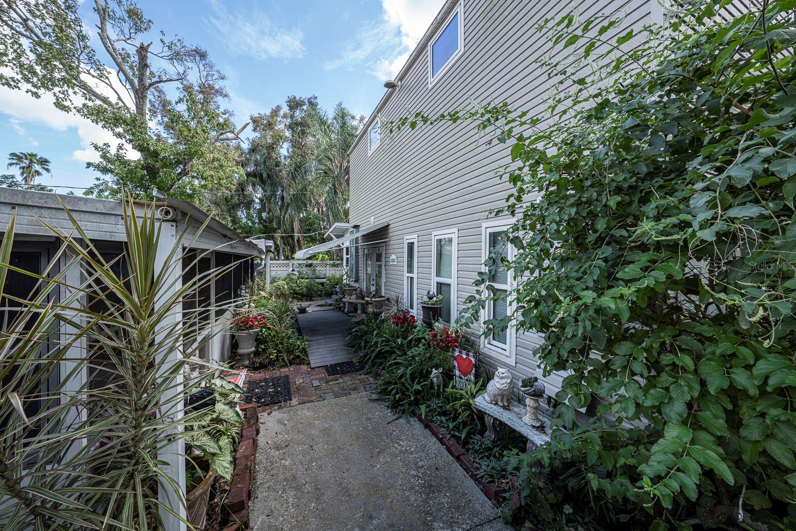 Walkway between the main home and the studio/workshop, looking east.