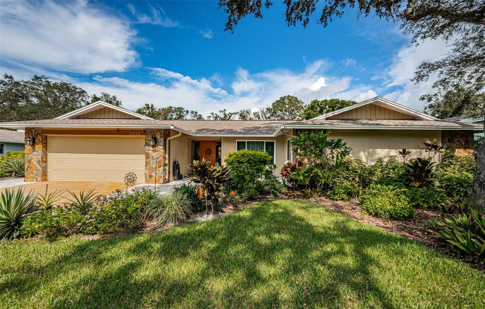 Almost 1/2 acre of lushly landscaped lot.  Home has been continuously updated. Roof, A/C, pool, impact windows and sliders all since 2019.