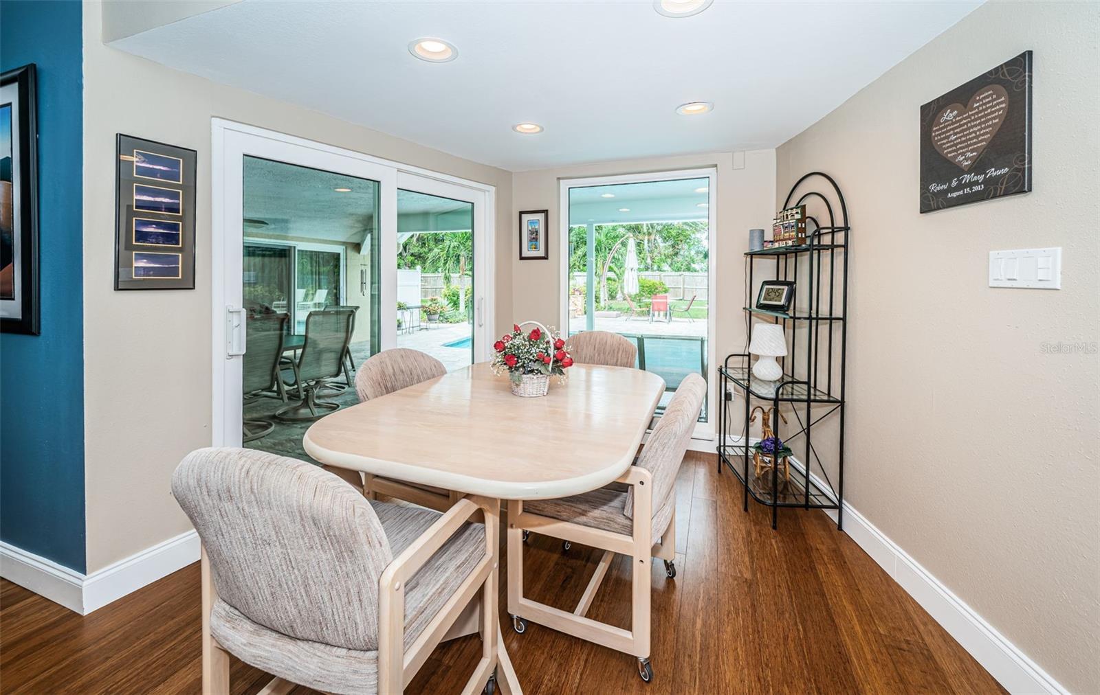 Breakfast nook overlooks the lanai and pool