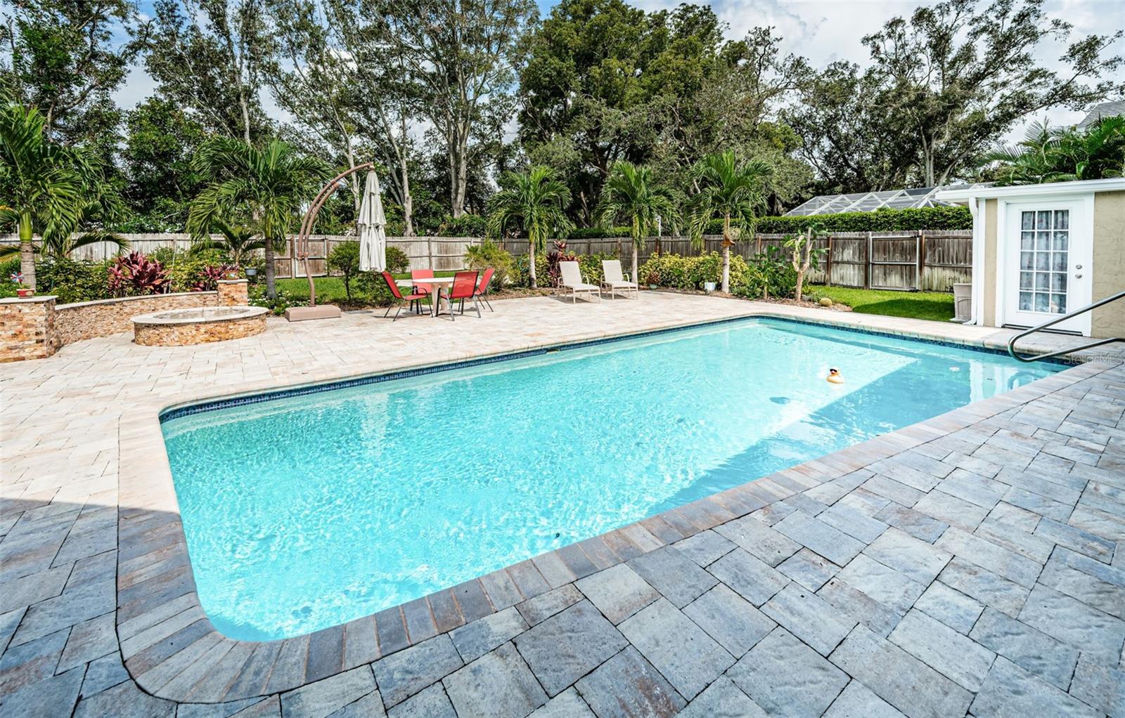 Beautiful pool and extended pavered deck