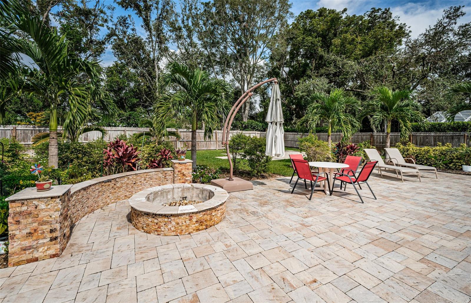 Fire pit with landscape lighting