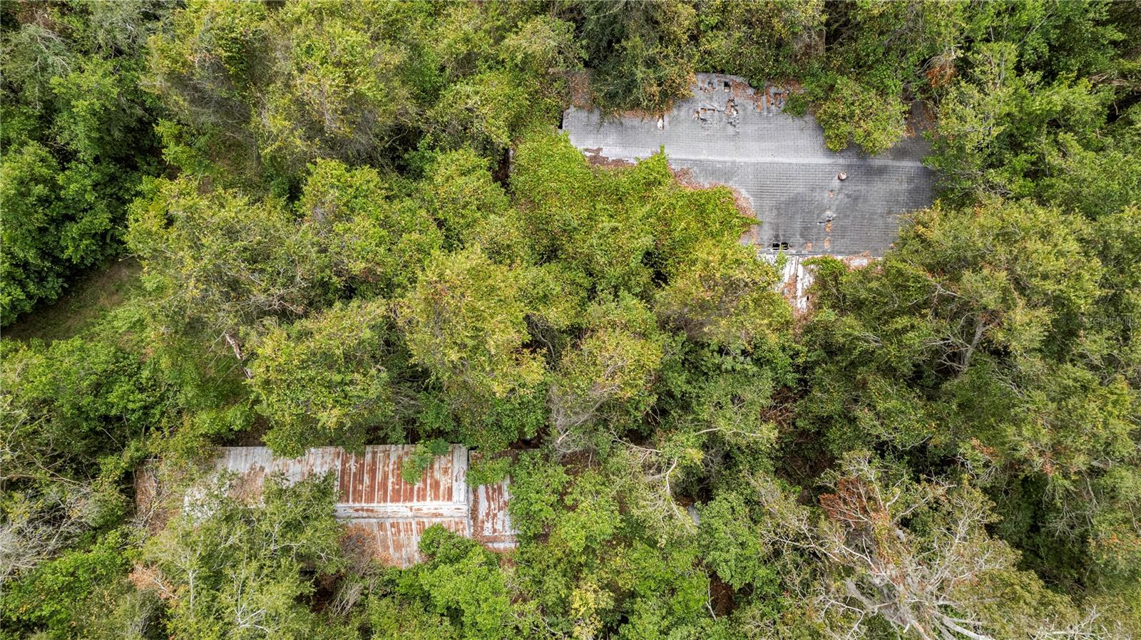 Aerial of manufactured home & covered storage.