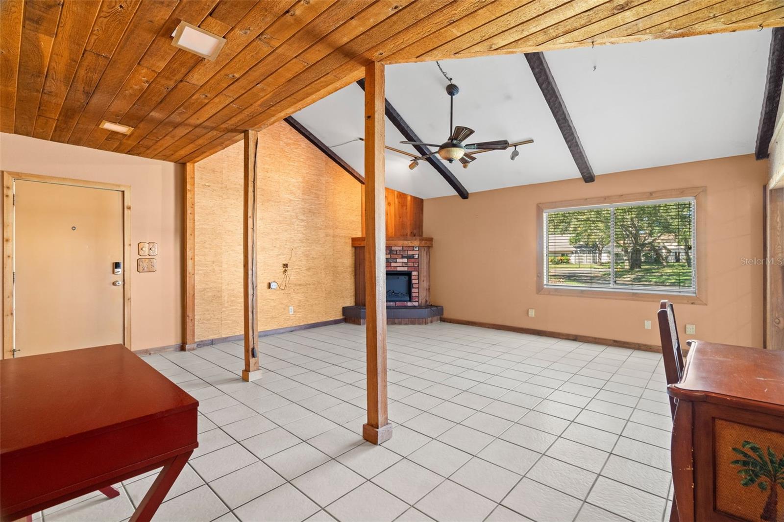 Large Living Room with Ceramic Tile Floors