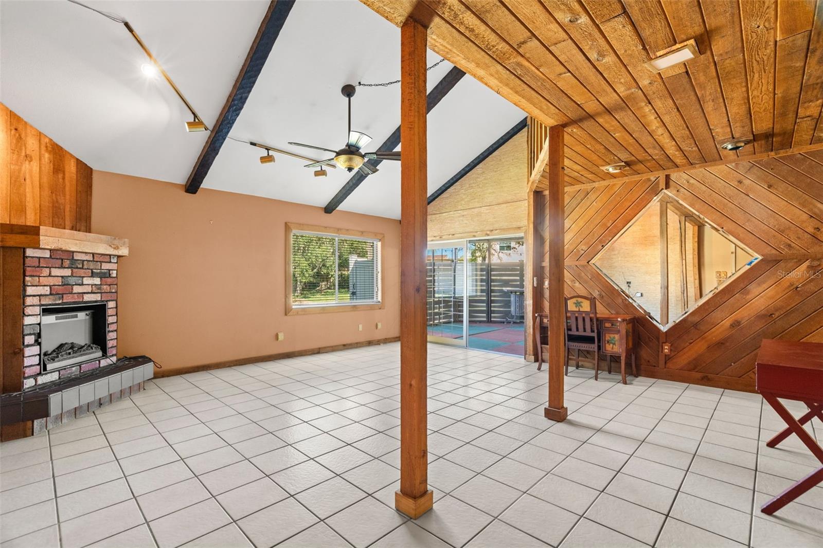 Large Living Room with Ceramic Tile Floors