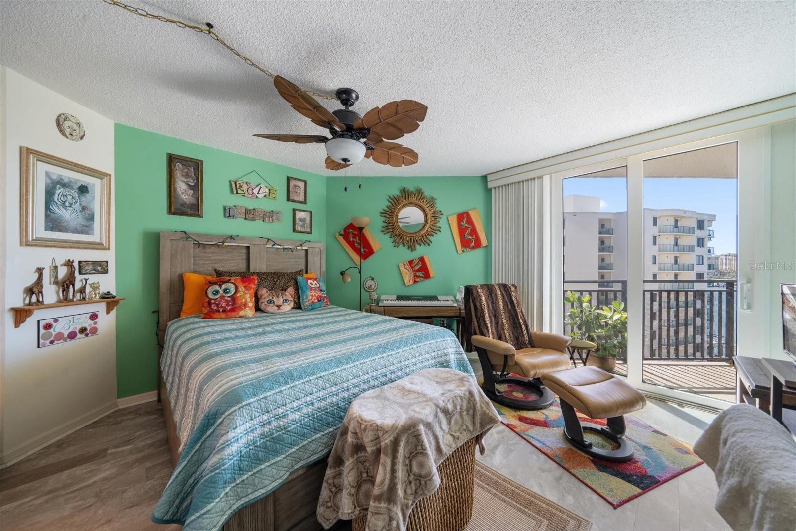 Primary bedroom overlooking the water