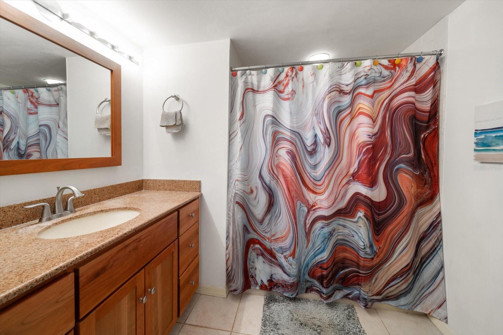 Ensuite Bathroom with tub and shower