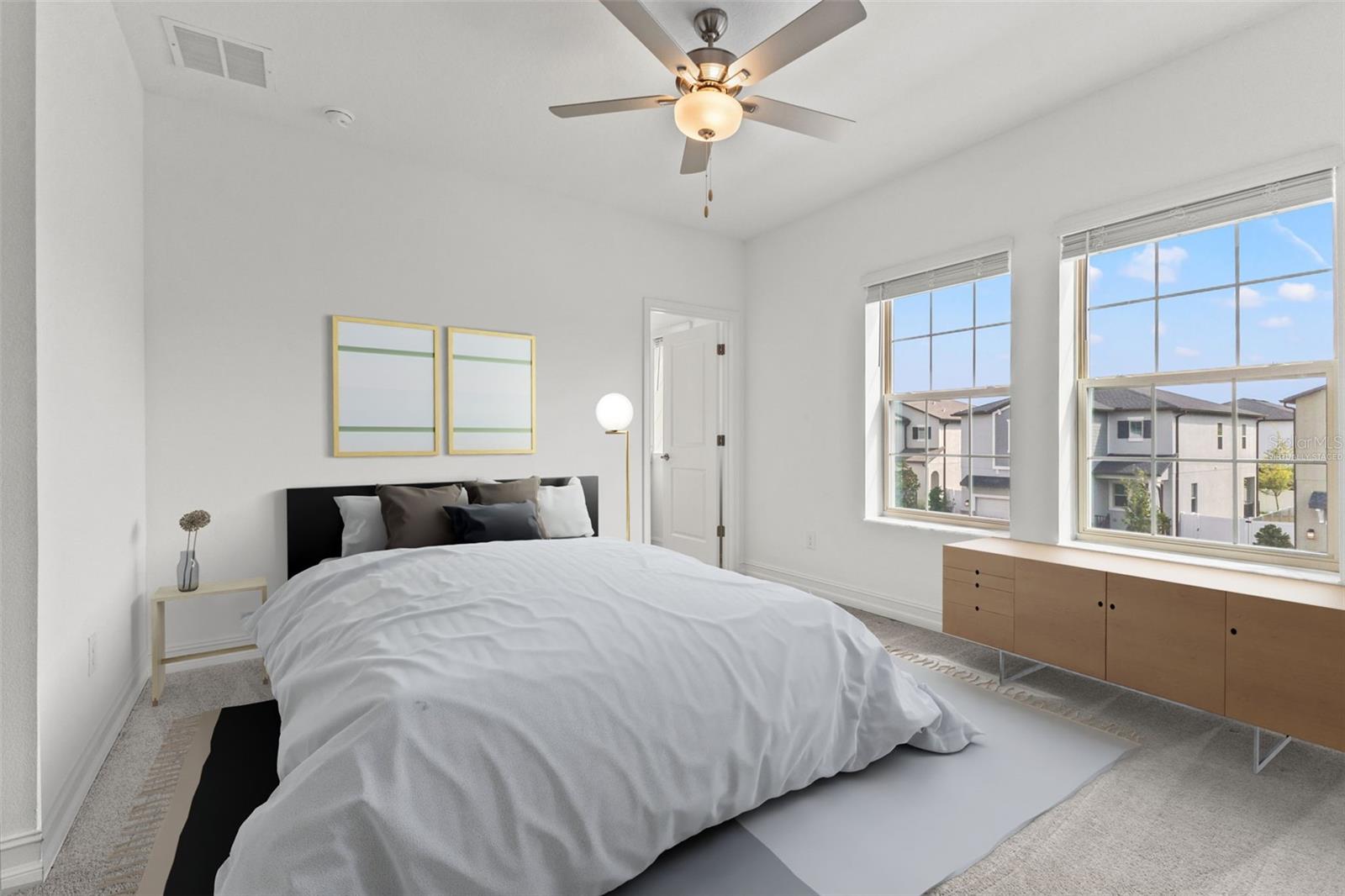 Bedroom with en-suite bathroom - The furniture is virtually staged