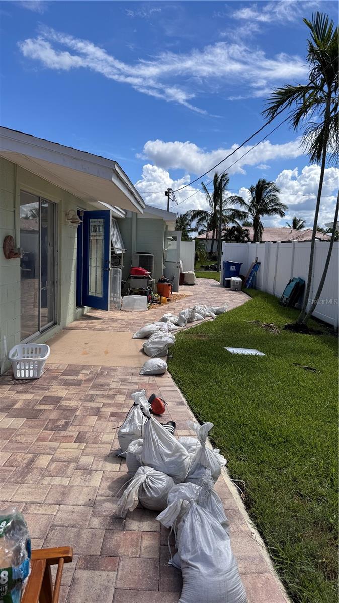 Side yard & gate post-hurricanes