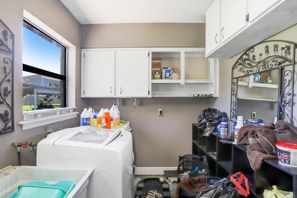 Laundry room is in garage