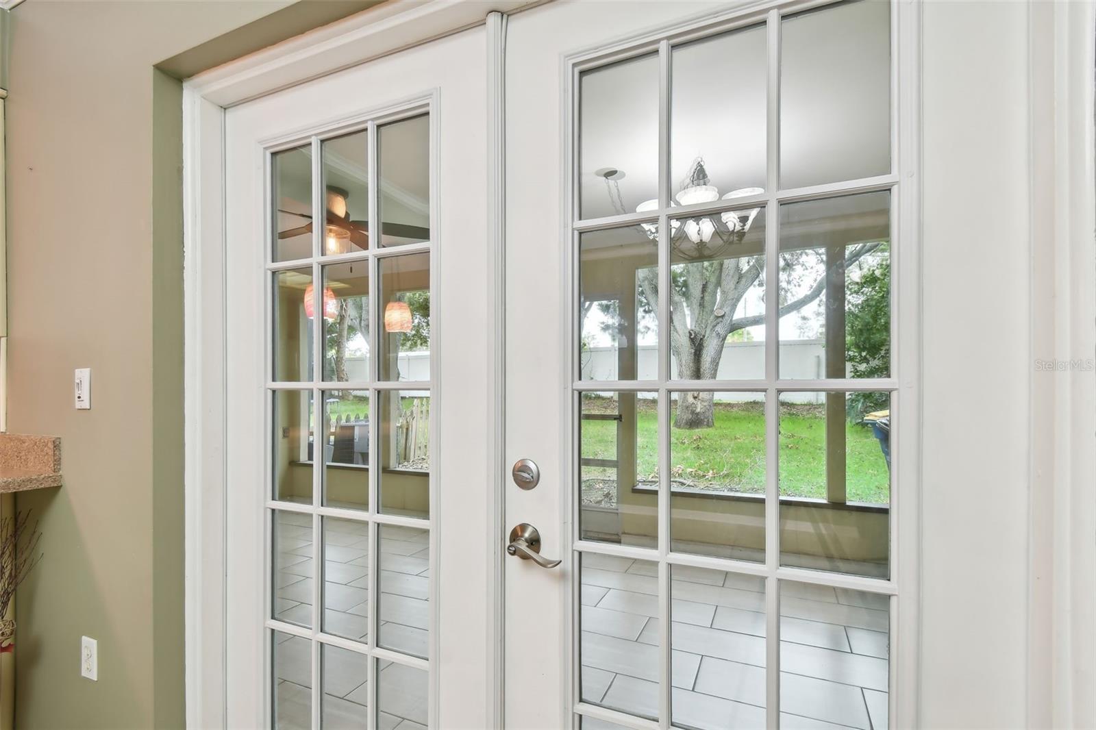 french doors leading to lanai and private back yard