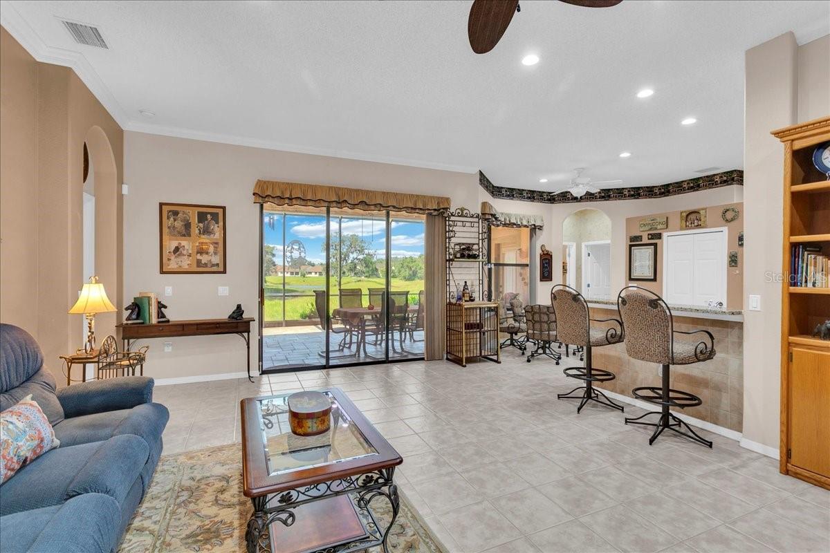 Large den that opens to eat-in kitchen