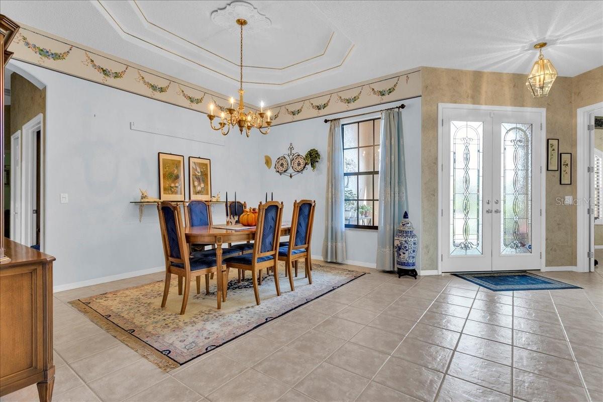 Formal dining with beautiful tray ceiling