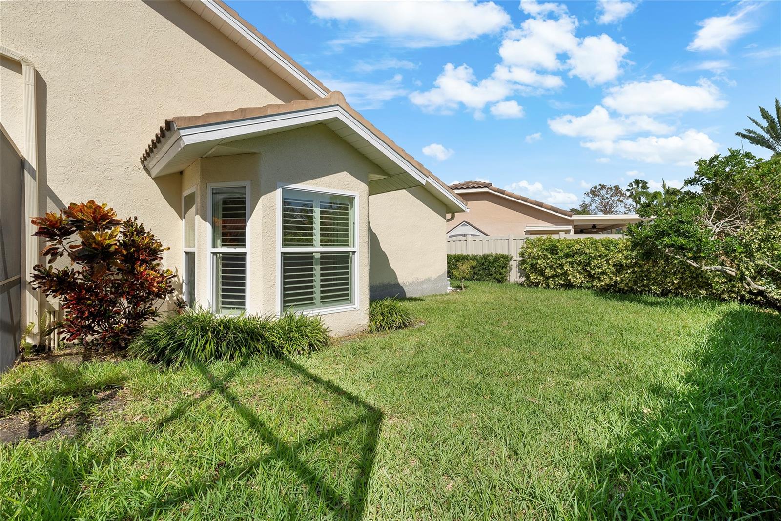 Fenced yard with ample yard space. Recent stucco repairs were made on the rear of the home.