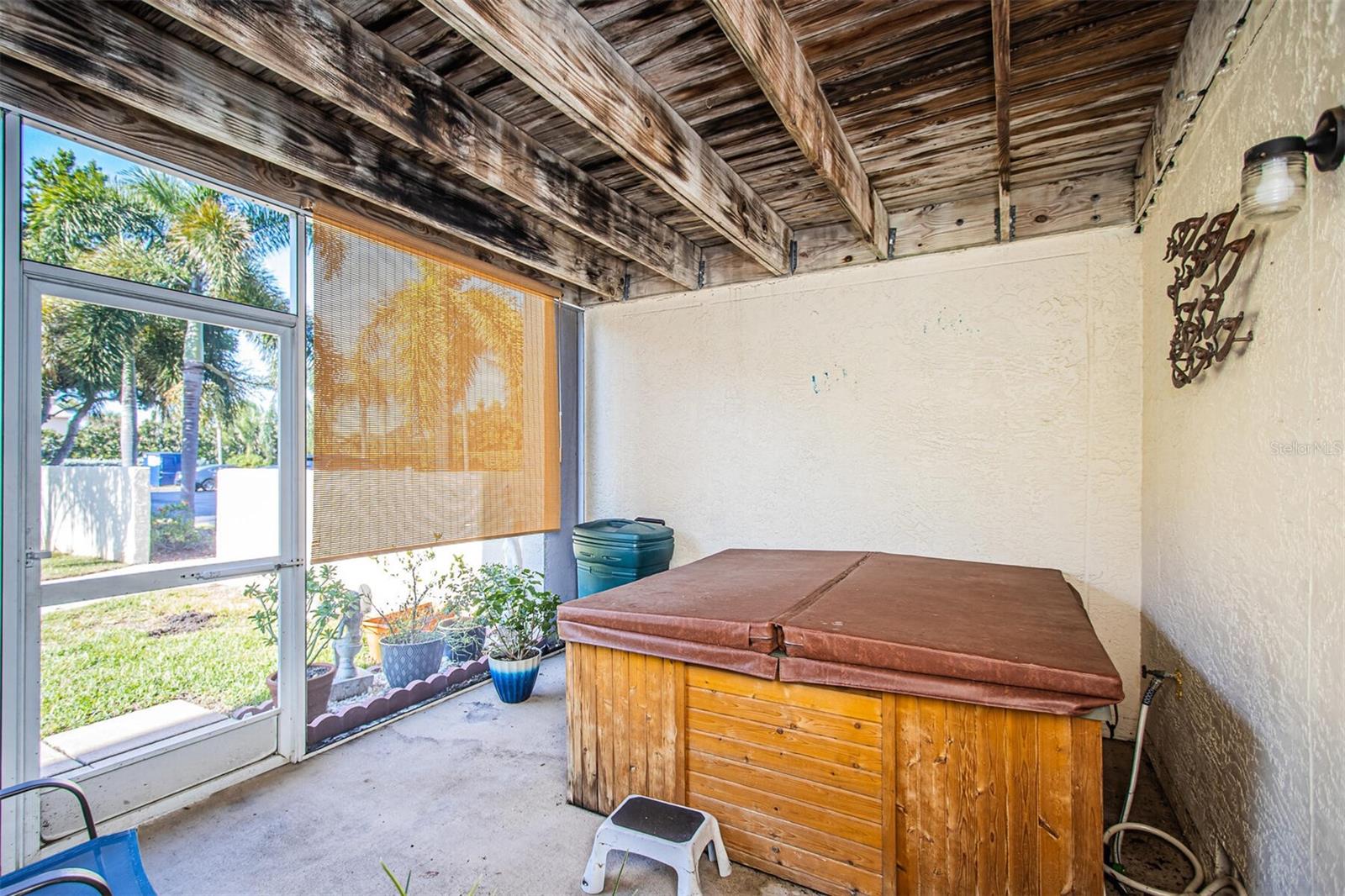 Hot tub on lower screen porch area