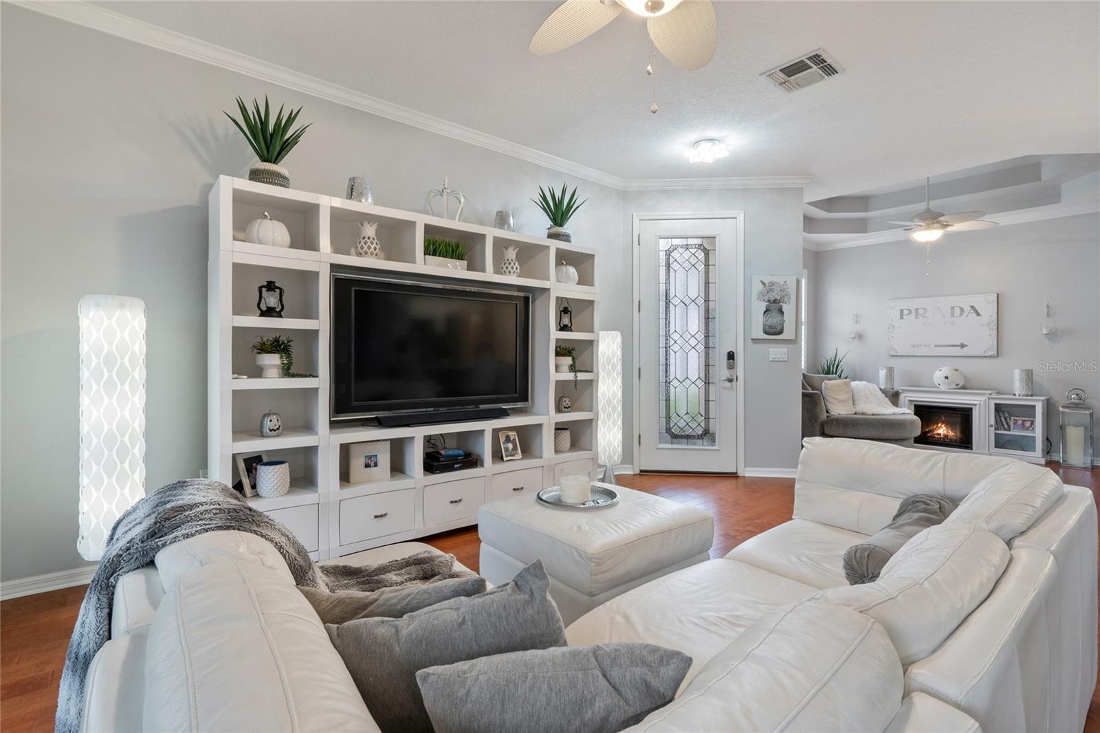 LIVING ROOM WITH VIEW OF FRONT DOOR