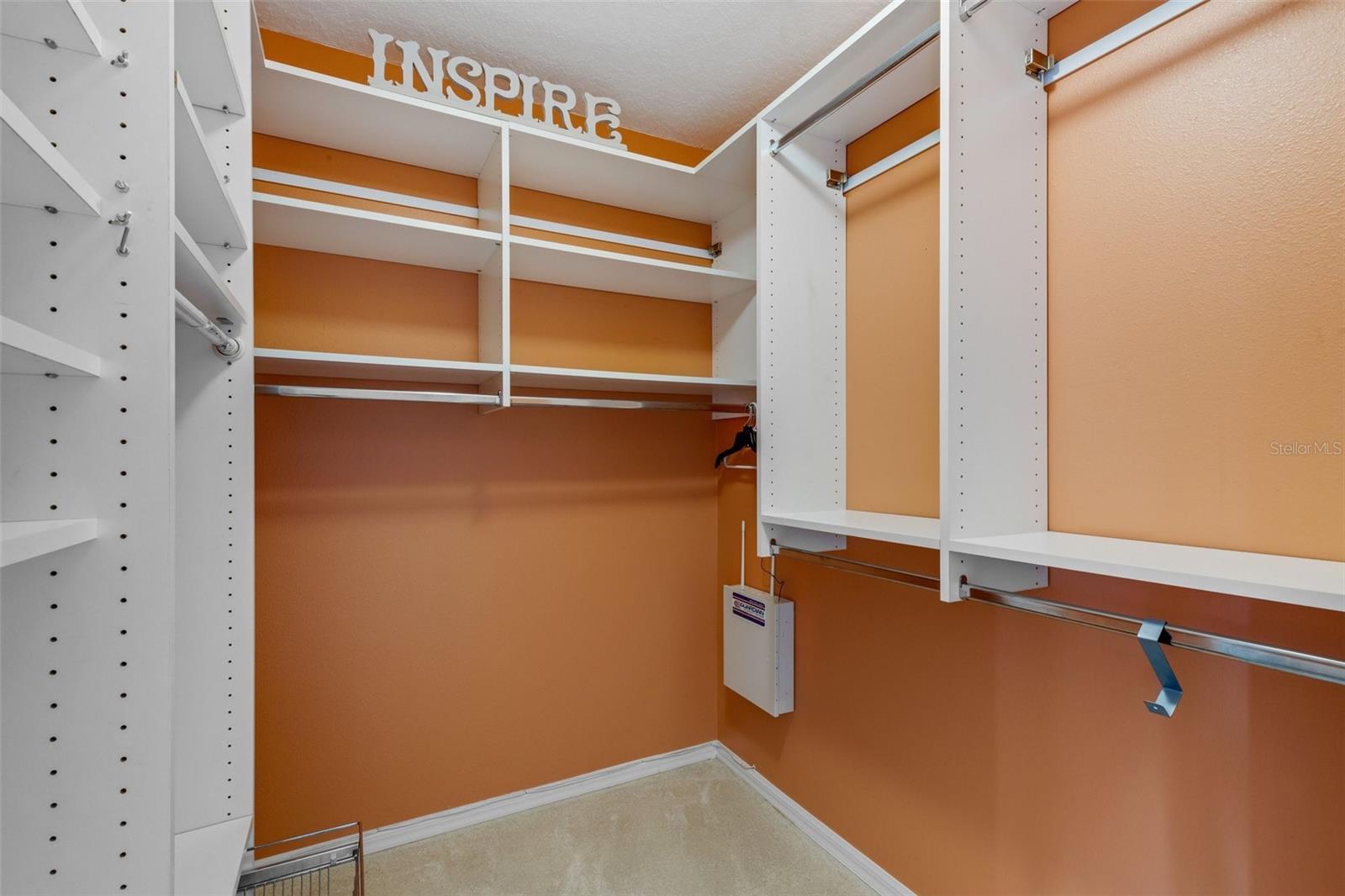 Custom closet system in the primary walk-in!