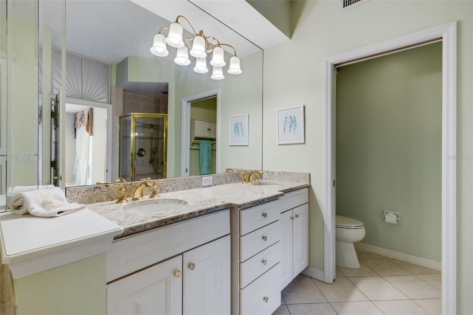 Dual sinks and granite counters in primary bathroom!