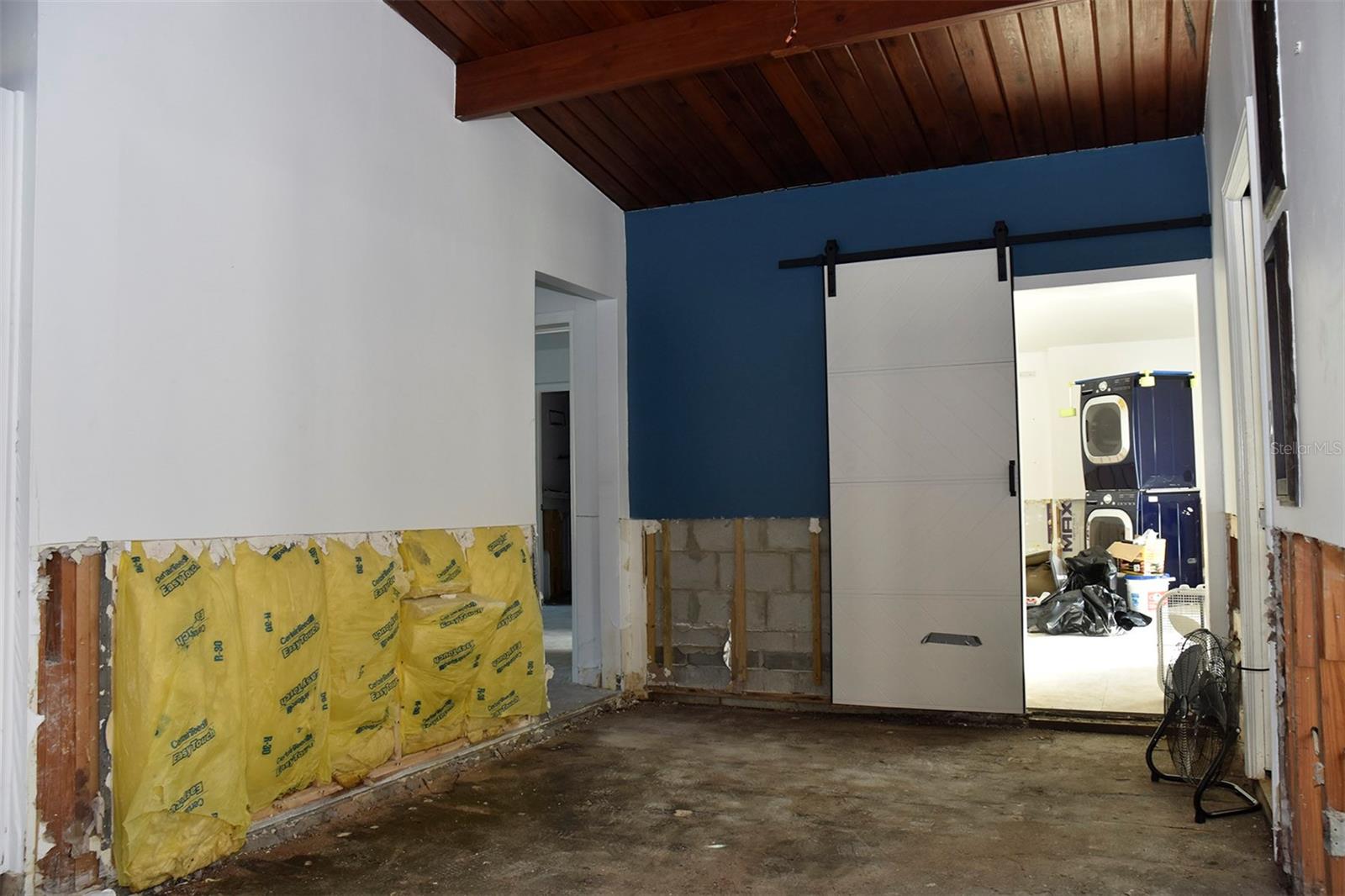 Post-flood image after remediation. This is the front entry or dining area.