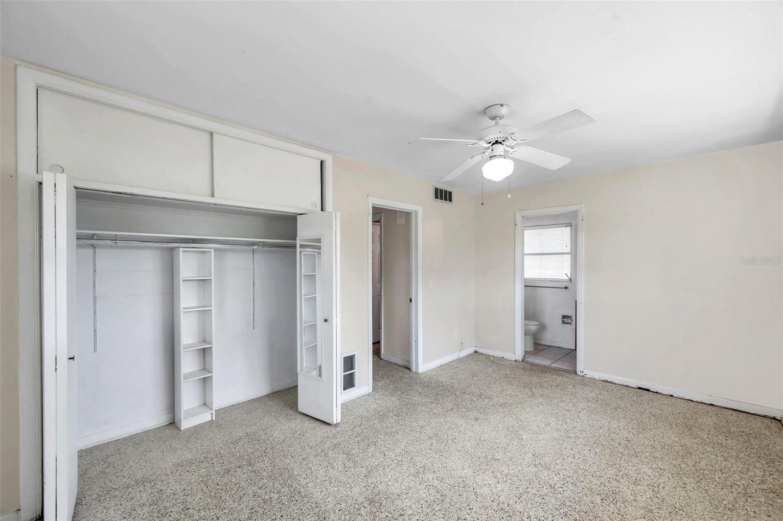 Primary BedroomBuilt-in storage above closet