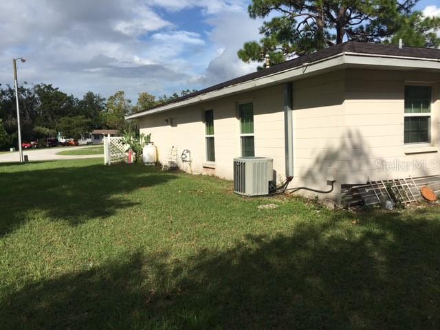 View of side yard from back yard