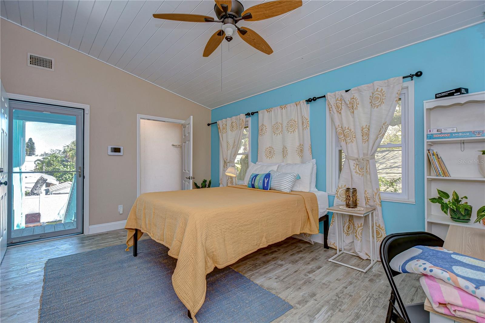 This bedroom has direct and private access to one of our backyard areas