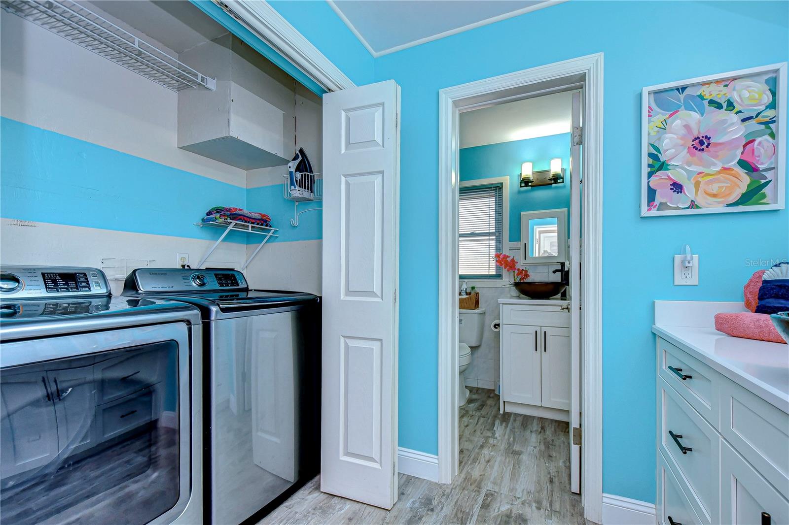 Our guest bath also houses the washer and dryer