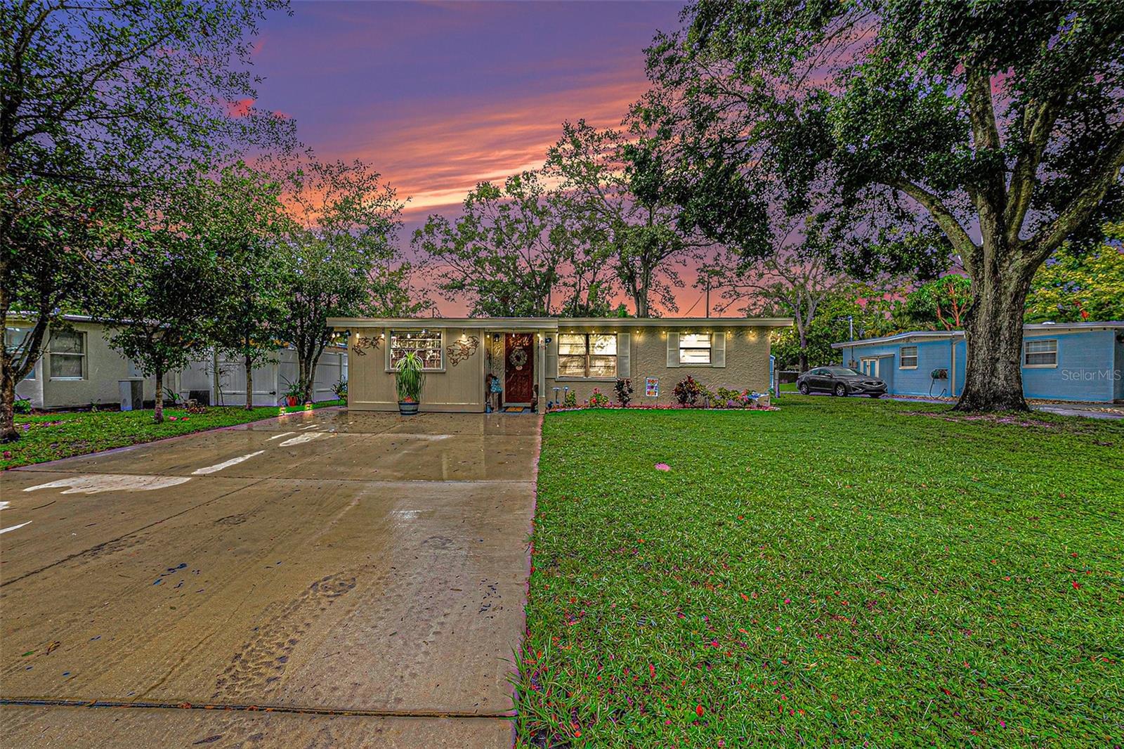 Front of Home With Sunset View