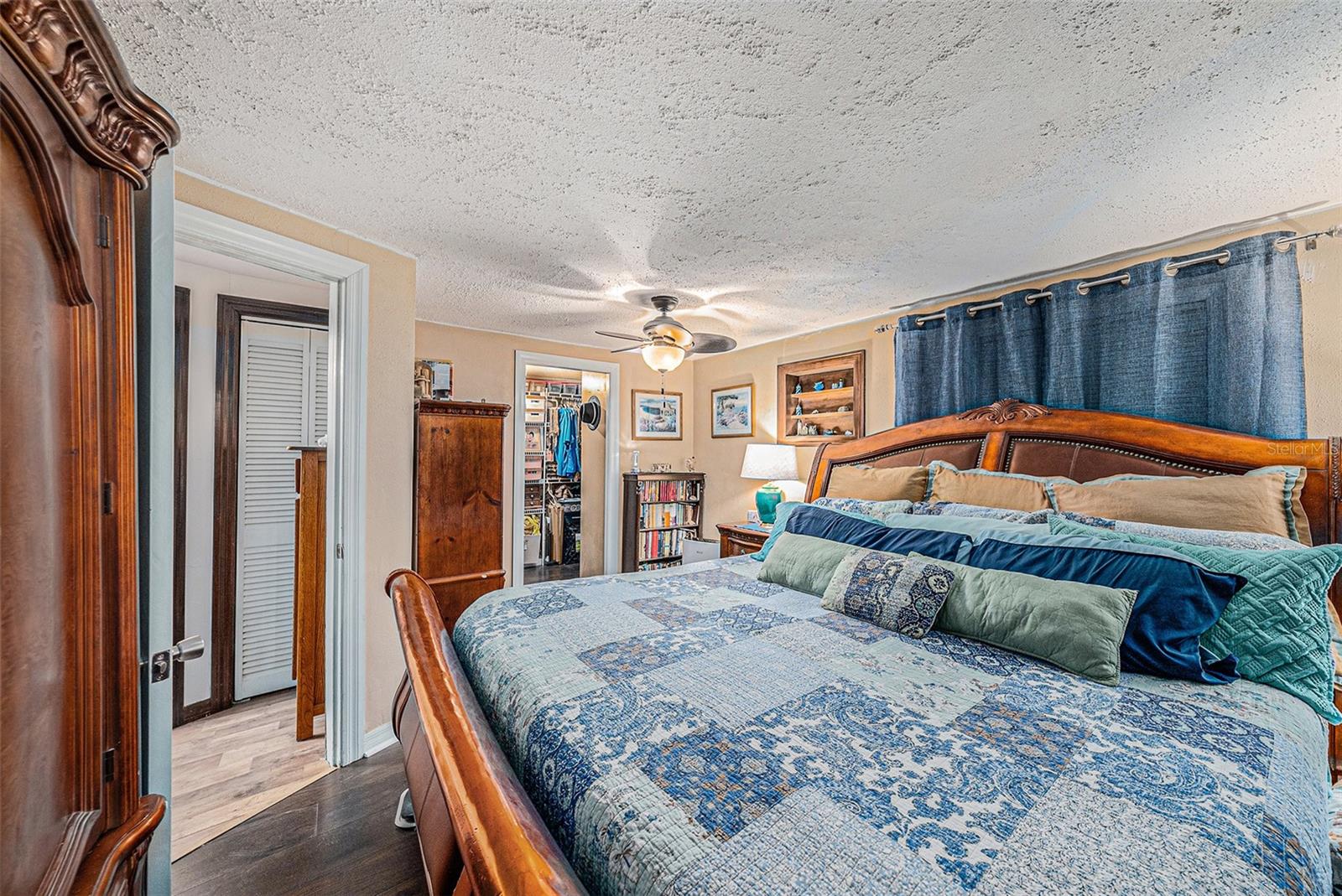 Primary Bedroom with hardwood floors Fits California King Bedroom Suite 2