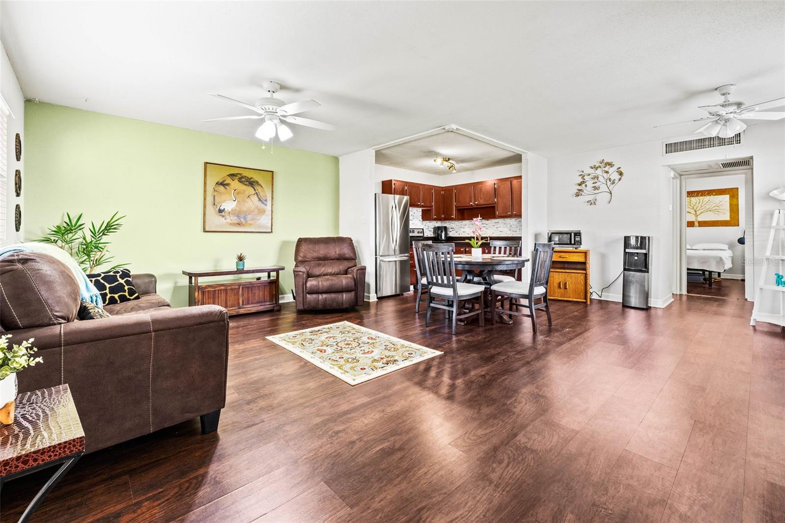 Living Room Opens to Dining & Kitchen