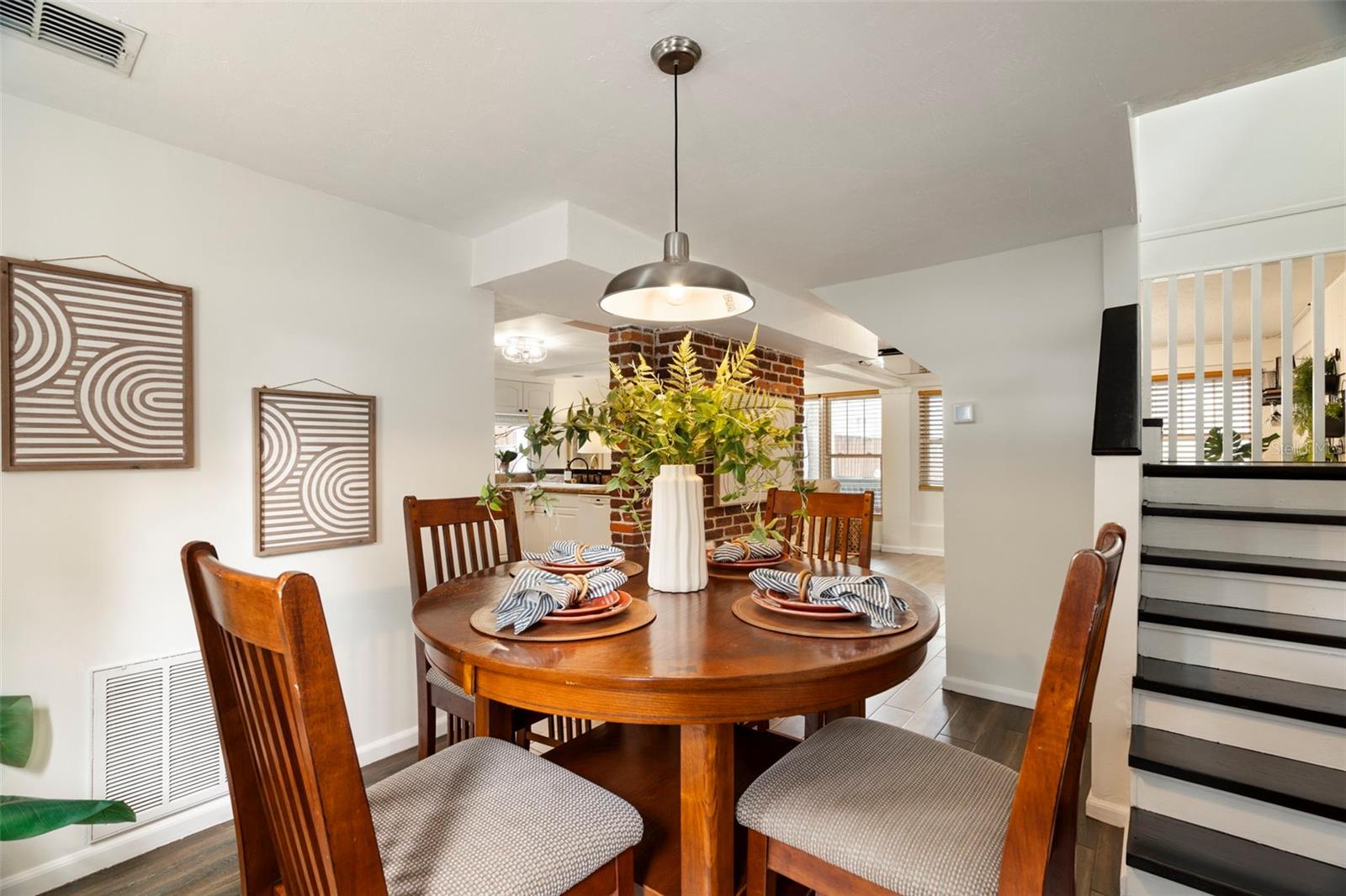 Stairs lead to dining area