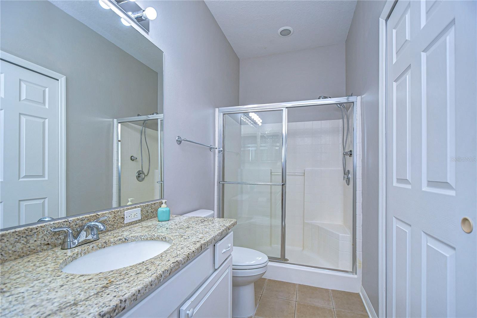 Master bath; tile floors; new granite, sink, new faucet; walk-in closet