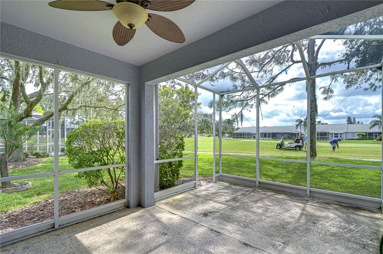 back patio; view of golf course & pond