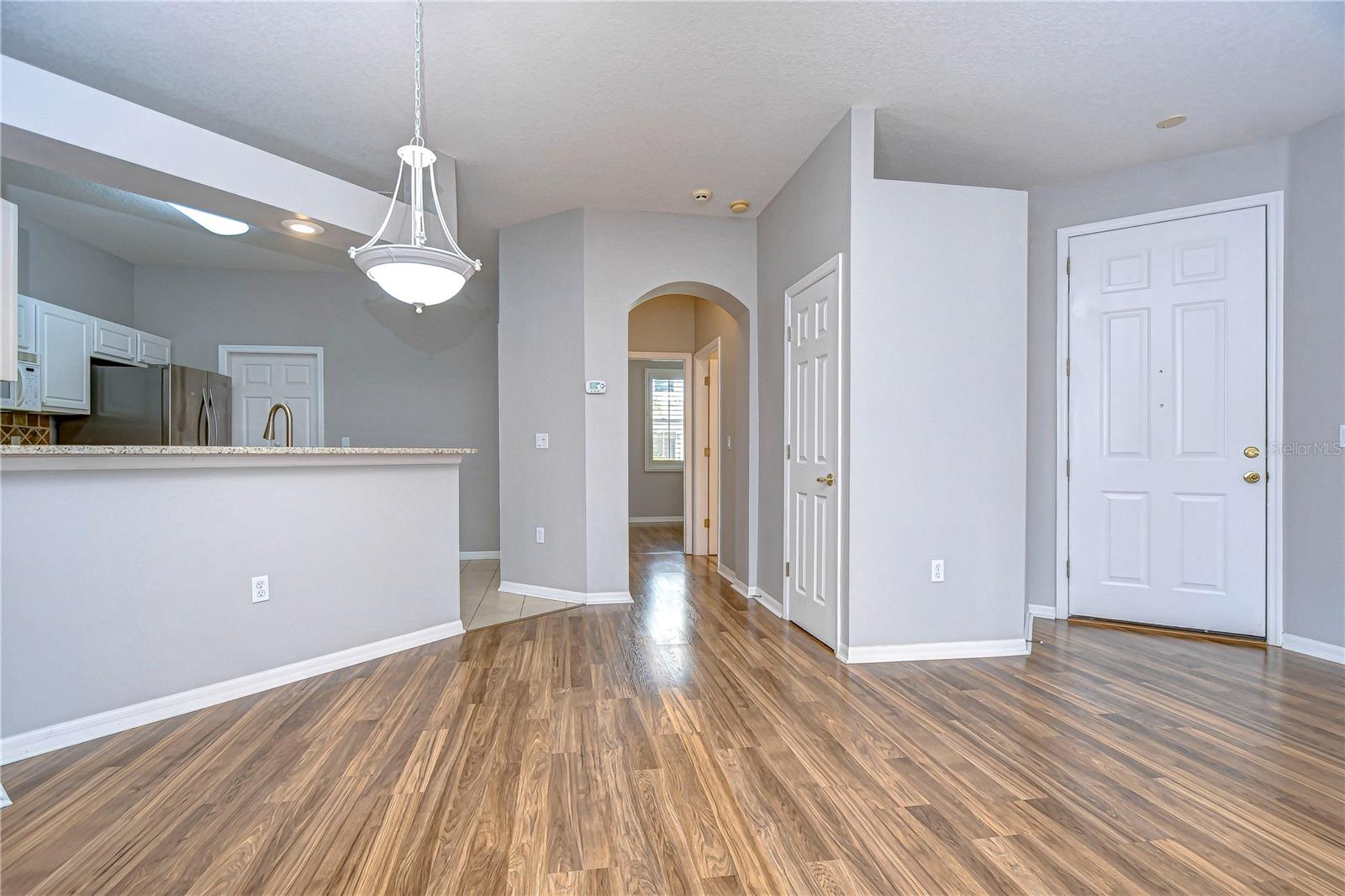 Living room; kitchen; entryway