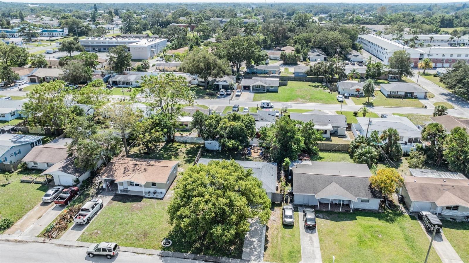 Aerial view of the home and the surrounding neighborhood