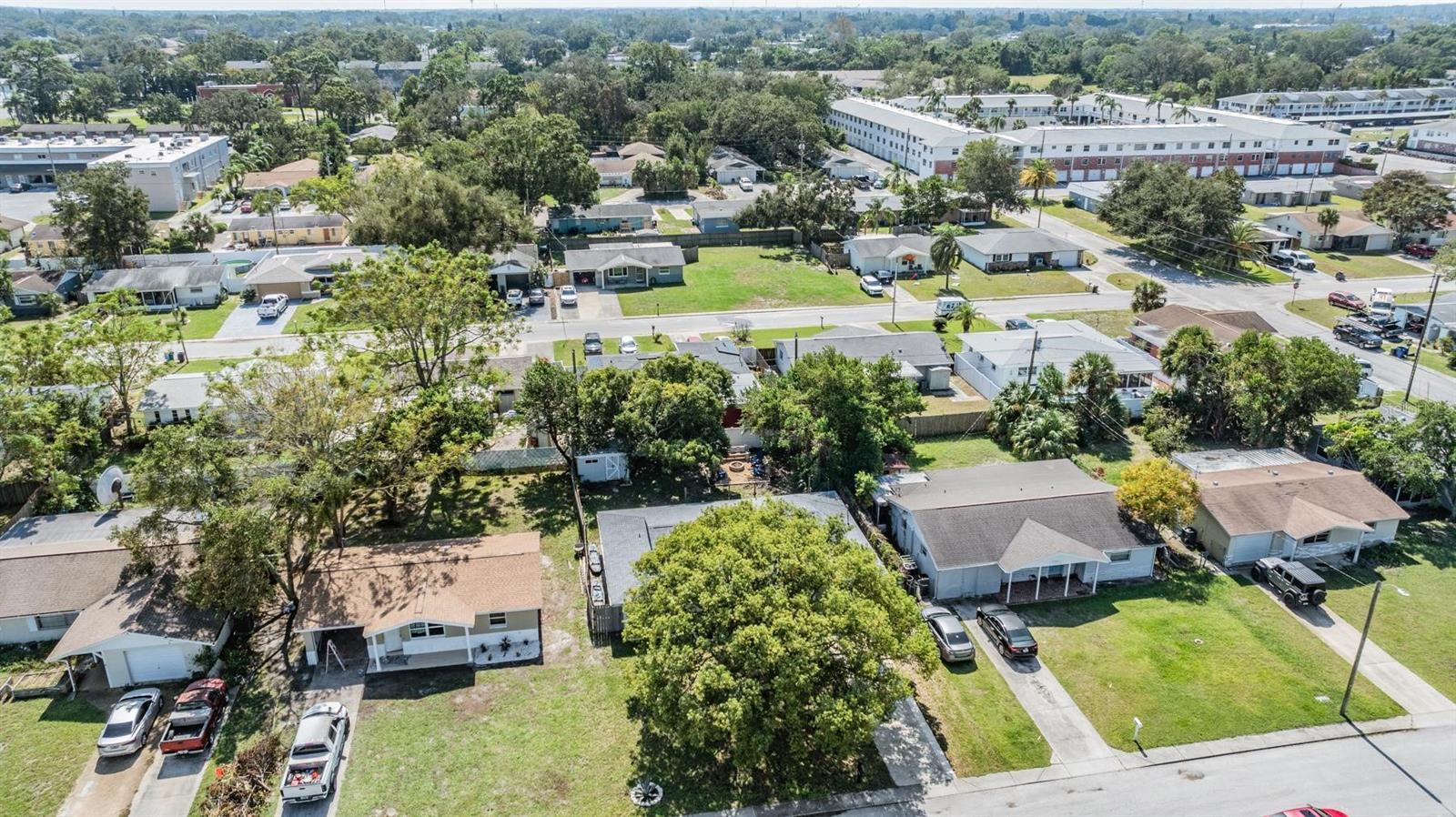 Aerial view of the home and the surrounding neighborhood