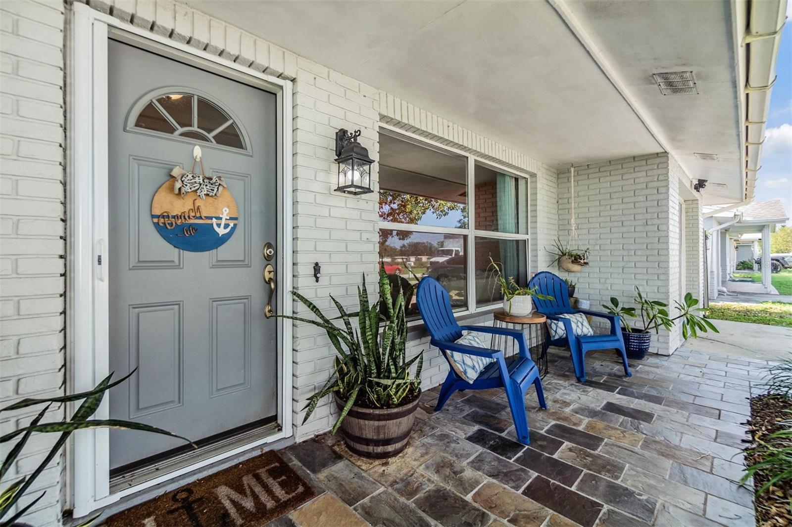 The front door with a large front porch