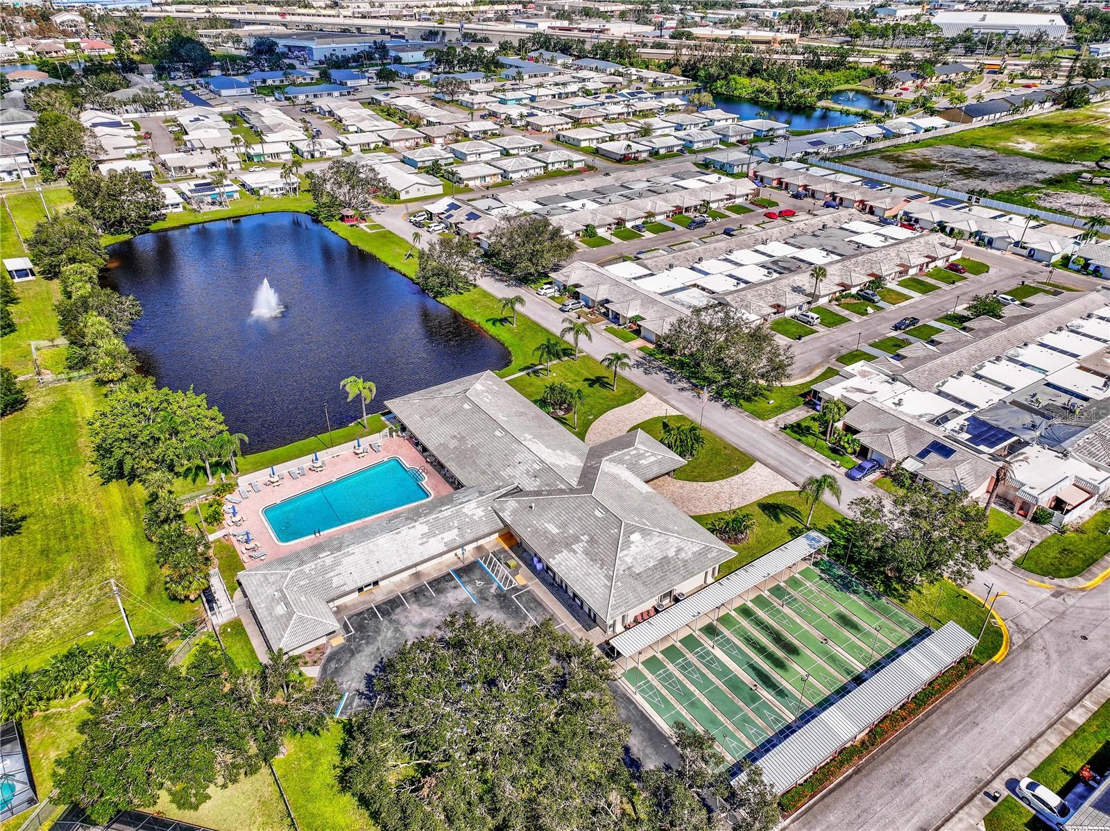 LARGE COMMUNITY LAKE WITH FOUNTAIN