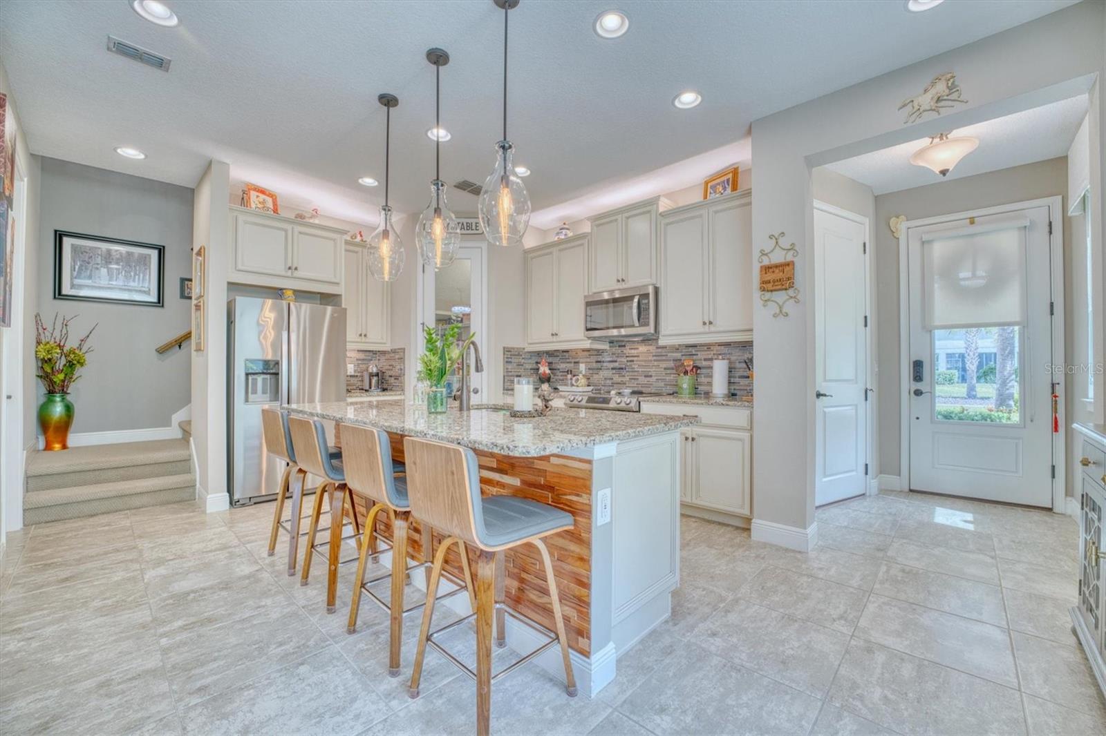 The Entry hallway leading to the kitchen/dining area