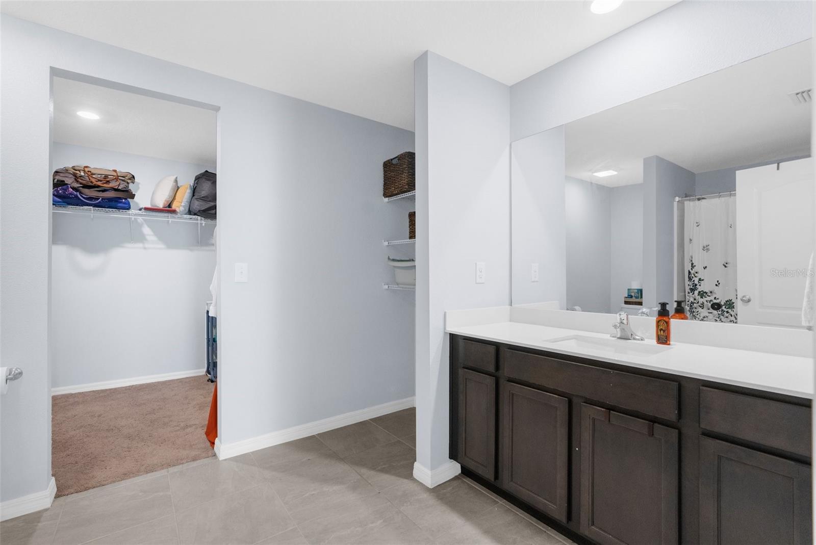 Primary ensuite bathroom - full bathroom with granite counters