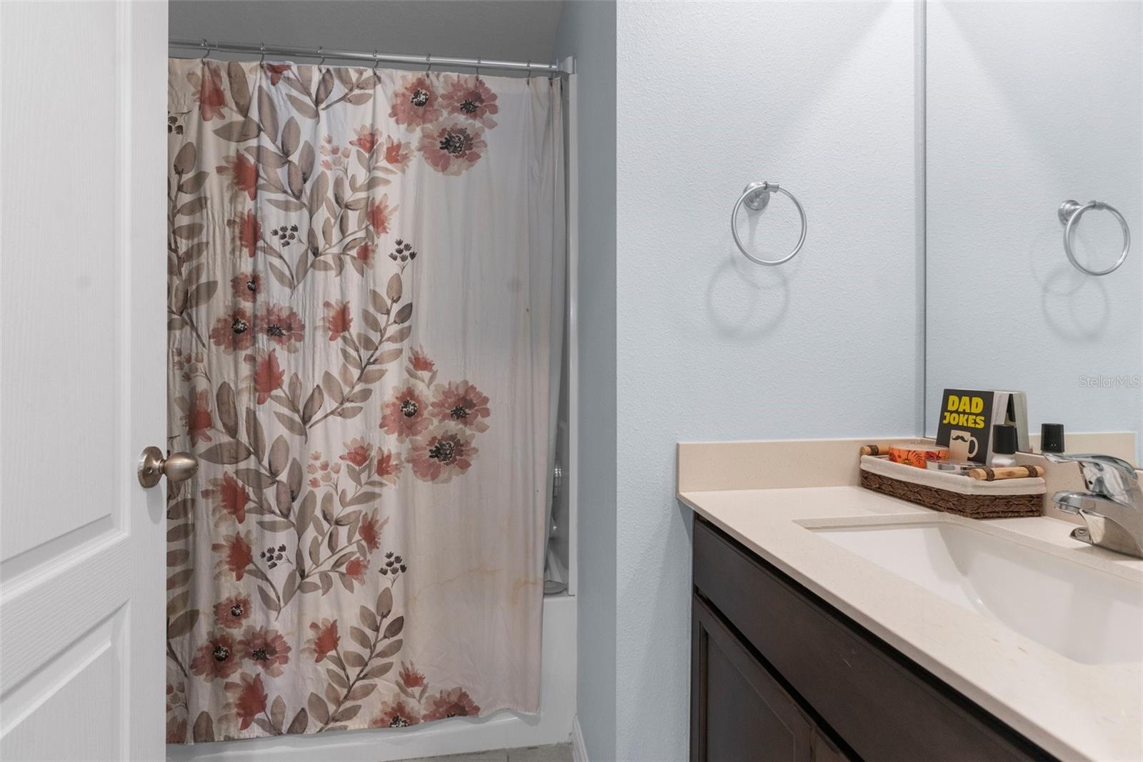 Guest bathroom - full bathroom with granite counters