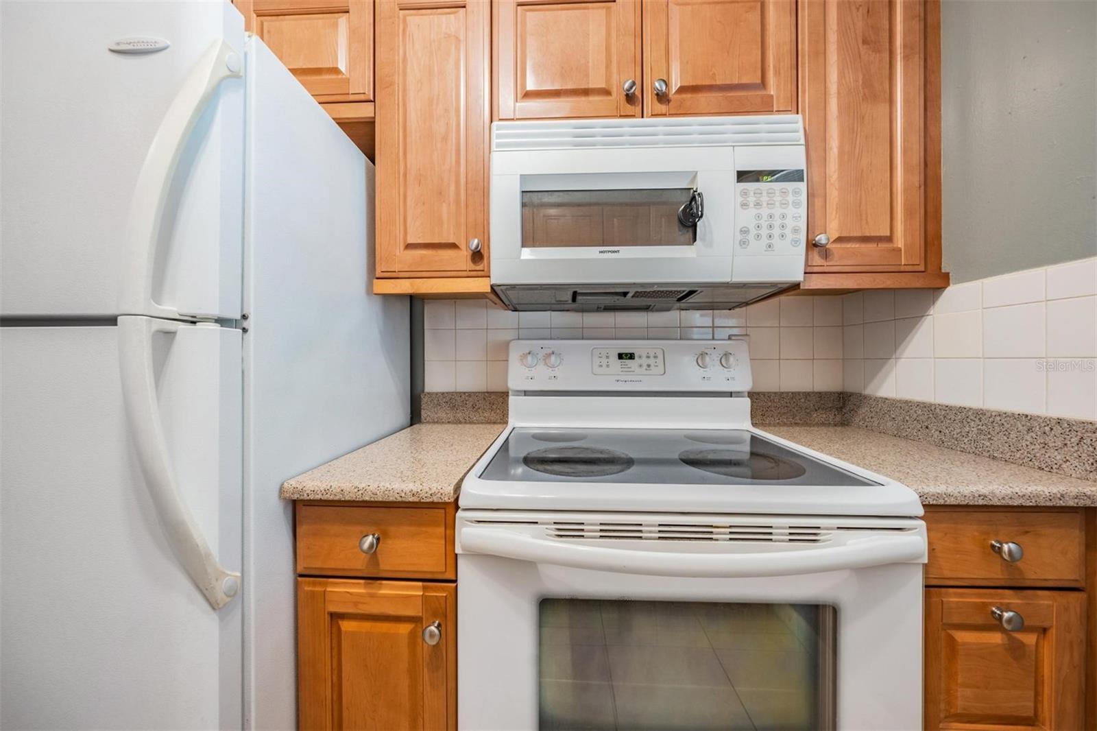 Granite and wood cabinets!