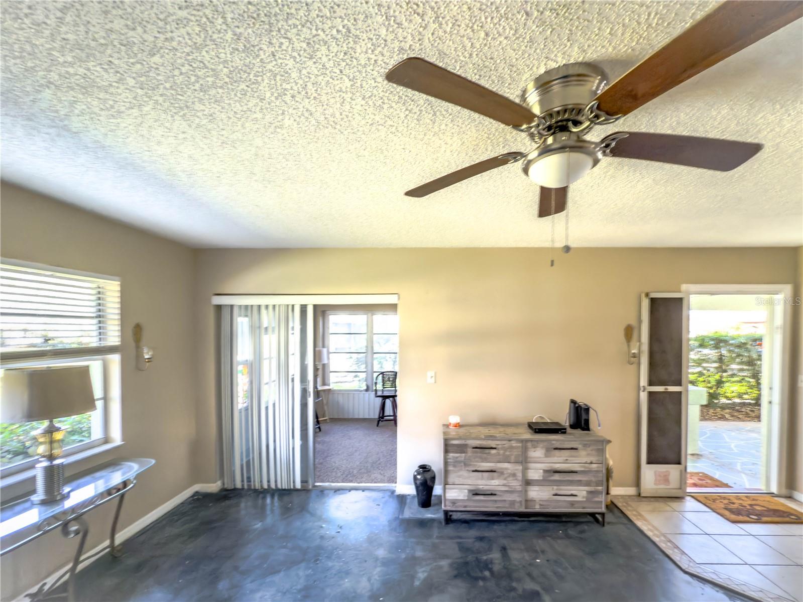 Living room, lanai on left, entry on right