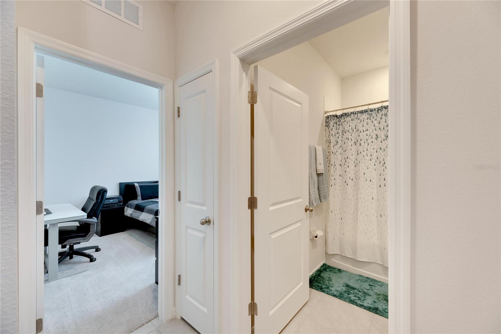 Hallway between bedrooms and guest bathroom!