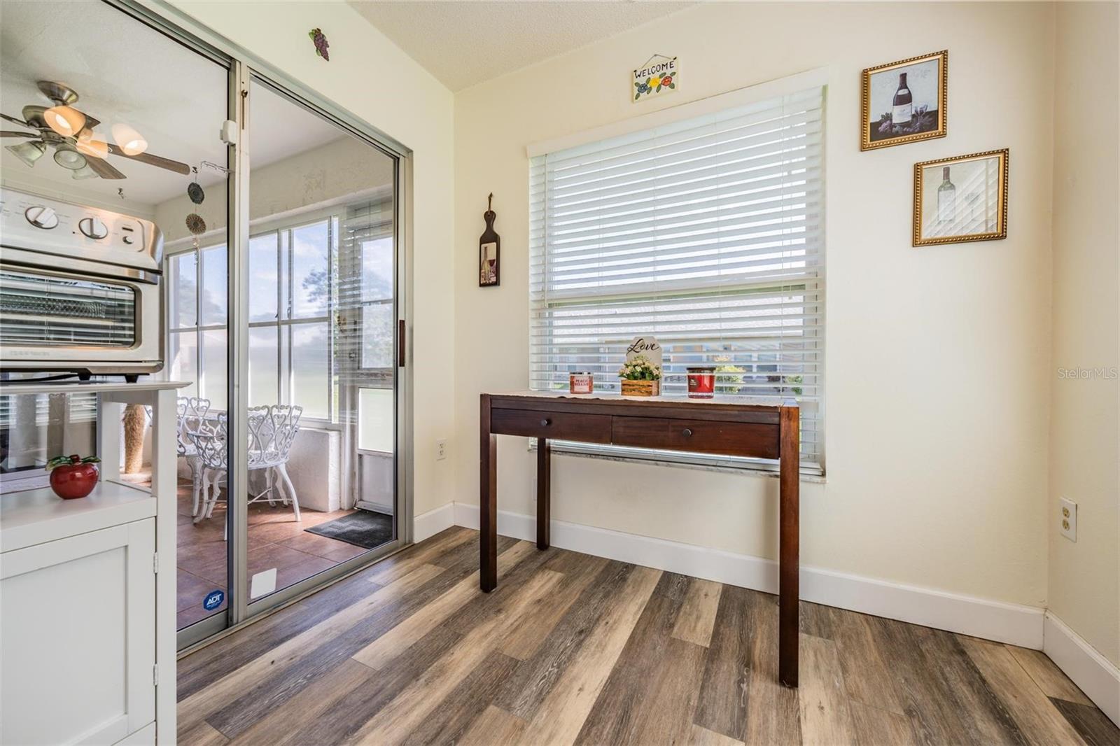 Dinette area in kitchen with slider to lanai