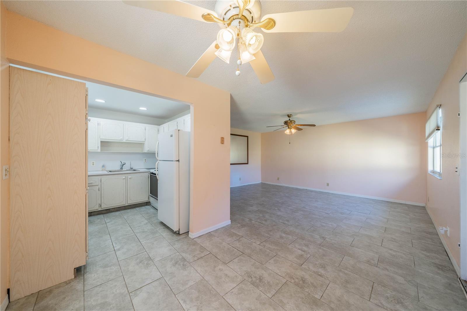 looking back at the living room and kitchen