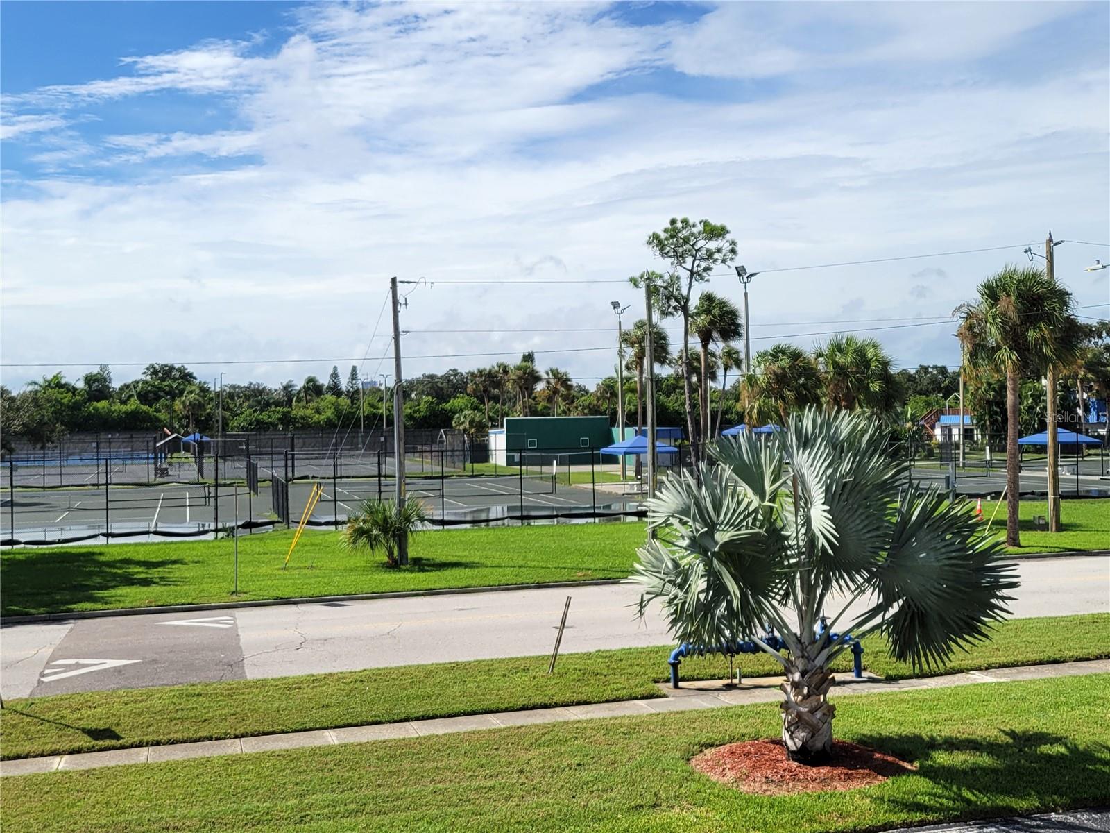 View of tennis courts from unit