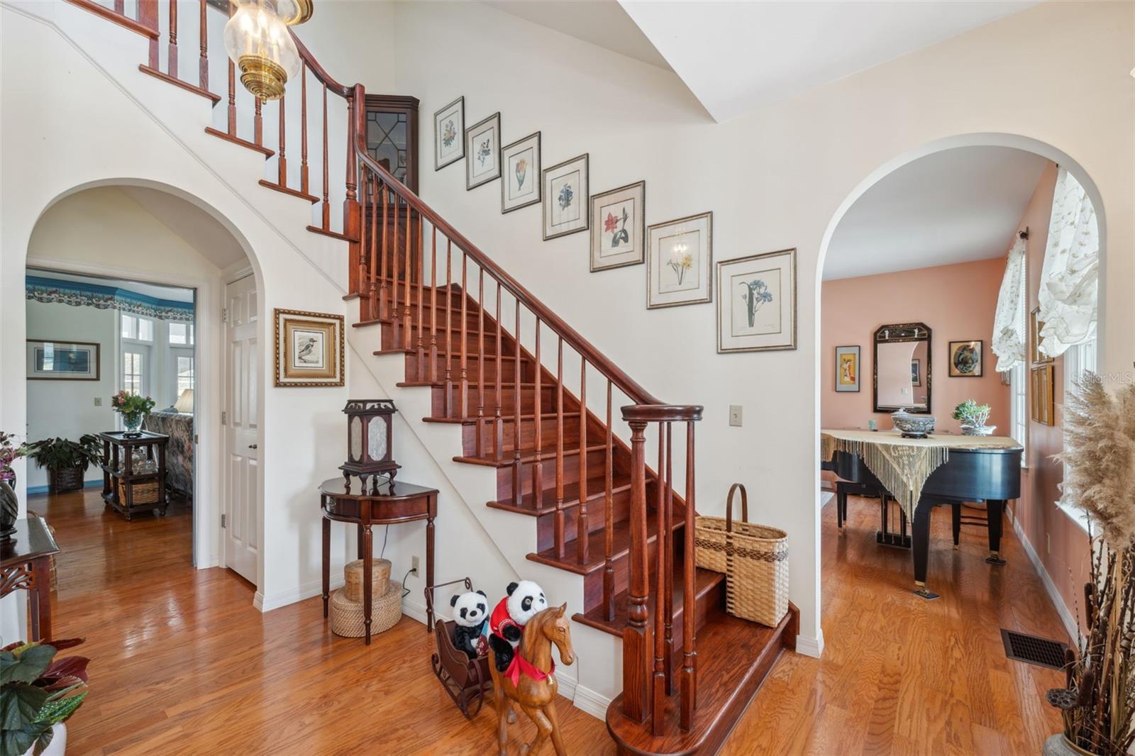 Gorgeous staircase greets you as you enter the spacious foyer. Formal living room to your right.