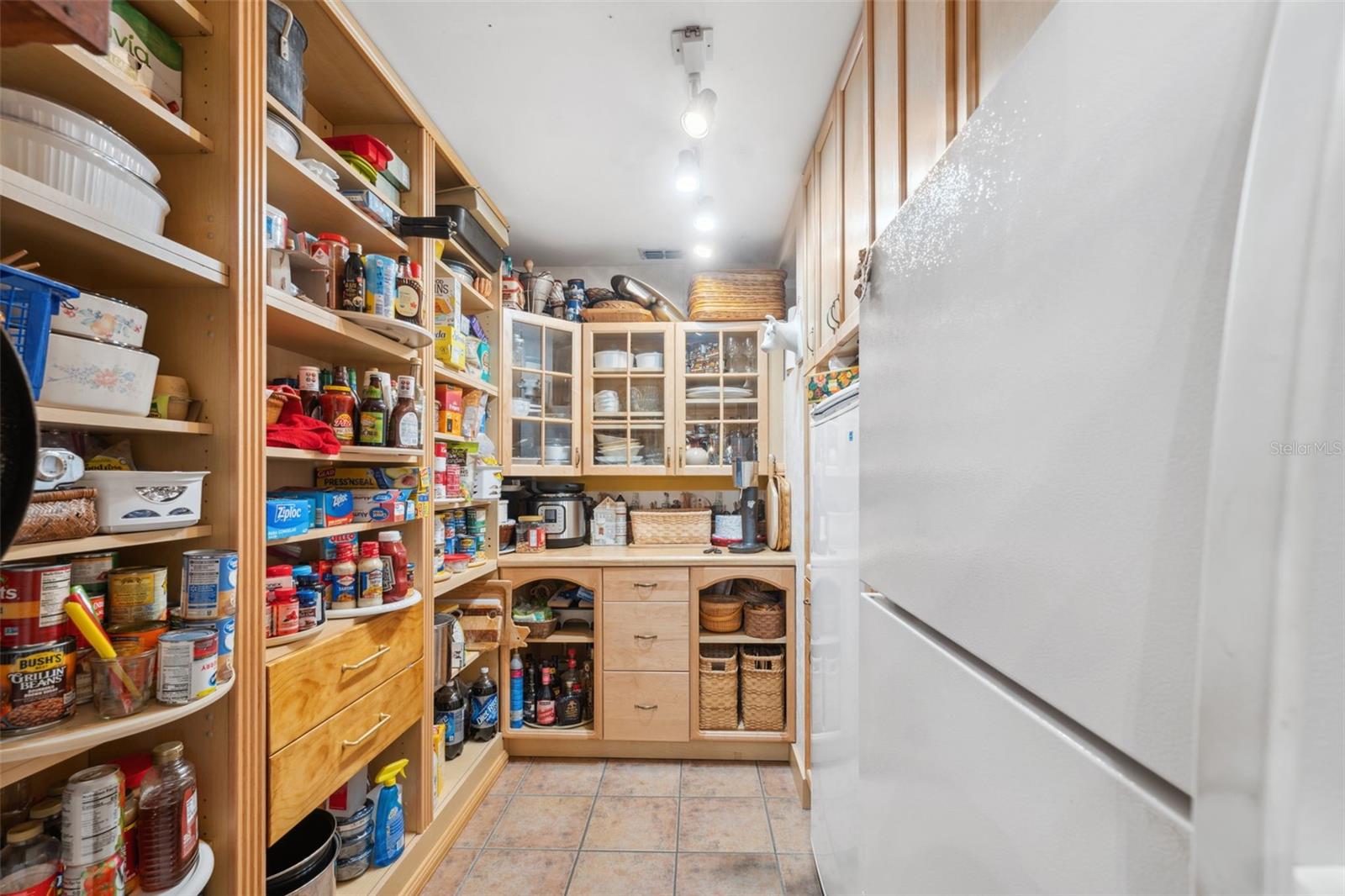 Oversized walk-in pantry off the kitchen.