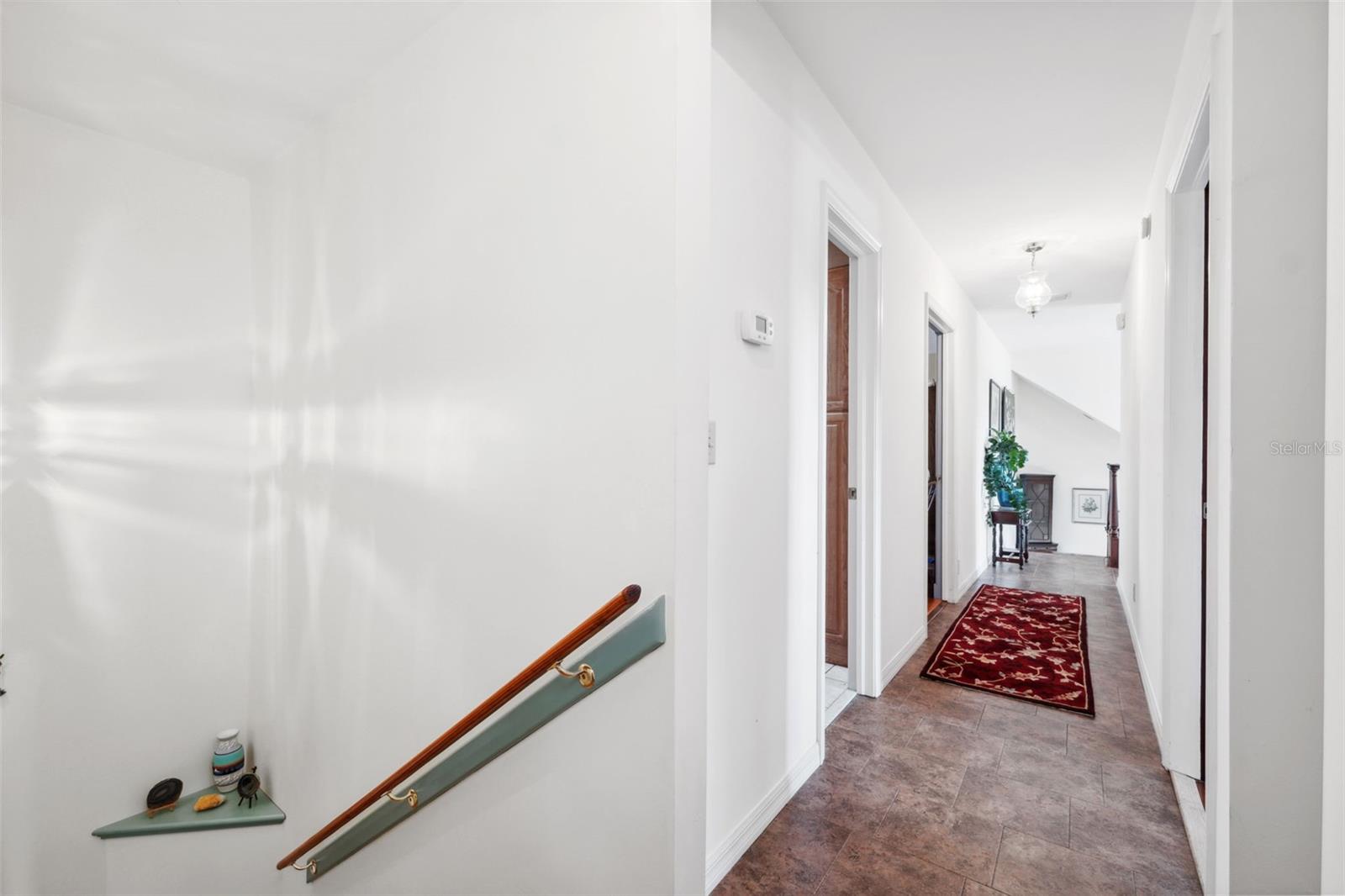 Second level hallway coming up from butler stairs.