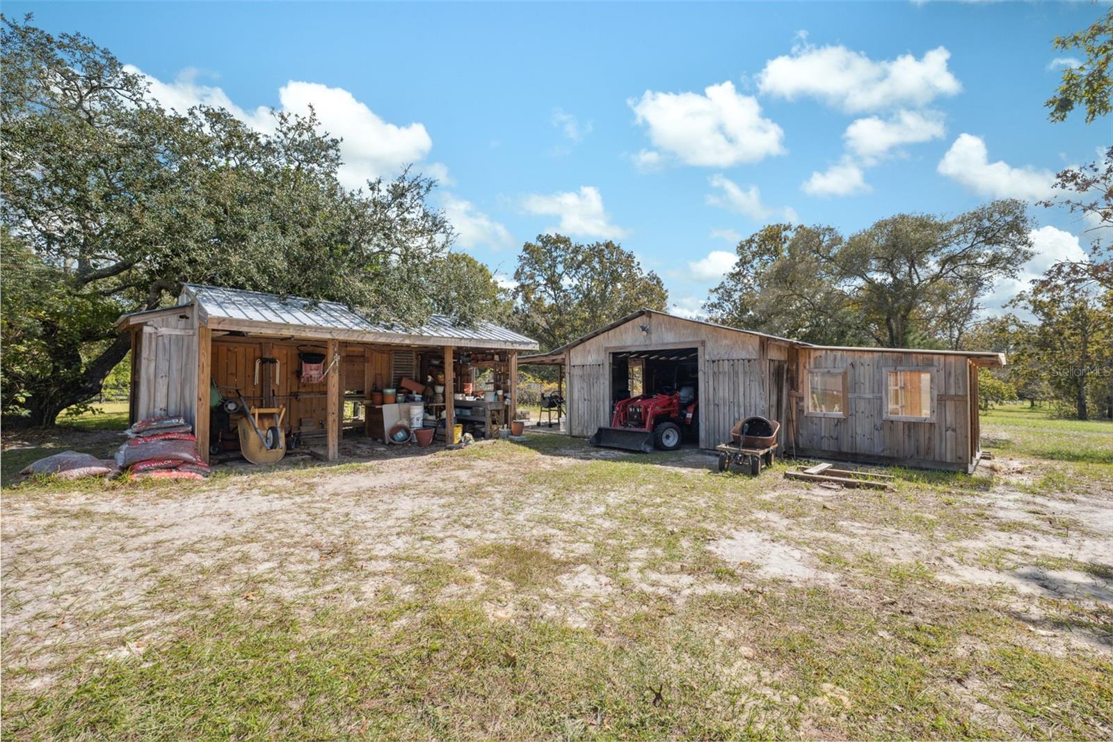 View of tractor and accessories shed.